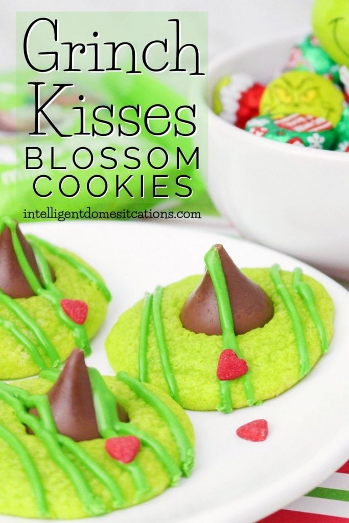 Green Hershey Kiss sugar cookies with red Grinch heart