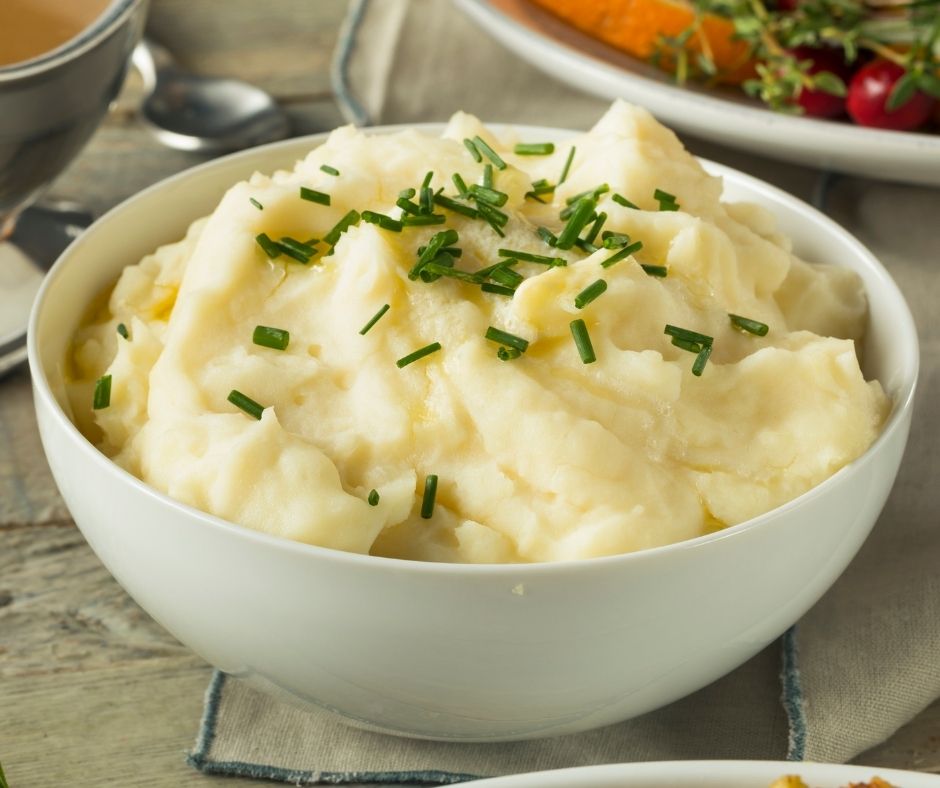 creamy mashed potatoes topped with fresh chives