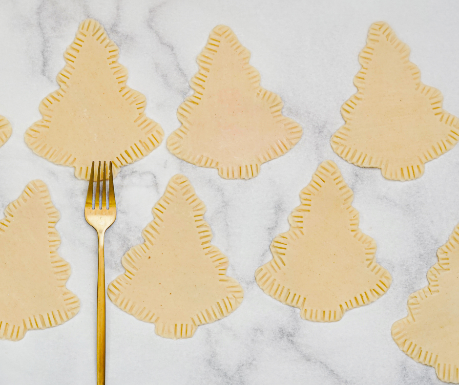 Fork next to Christmas tree shaped hand pies