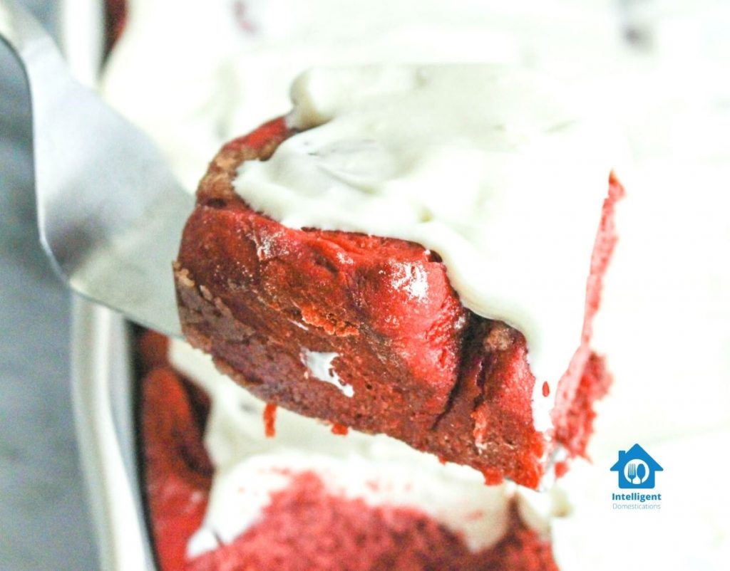 Red Velvet Cinnamon Rolls covered with cream cheese icing