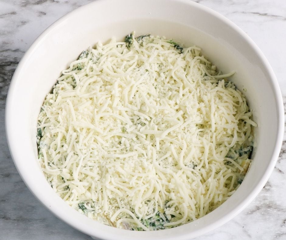 Spinach Artichoke dip mixed in a bowl