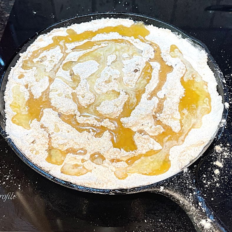 Melted butter on top Cake mix topping on apple dump cake