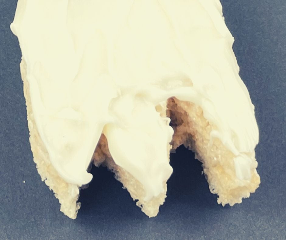 Cut the bottom of the ghost into an 'M' shape