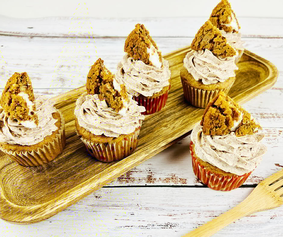 Oatmeal Cream Pie Cupcakes on a wooden tray