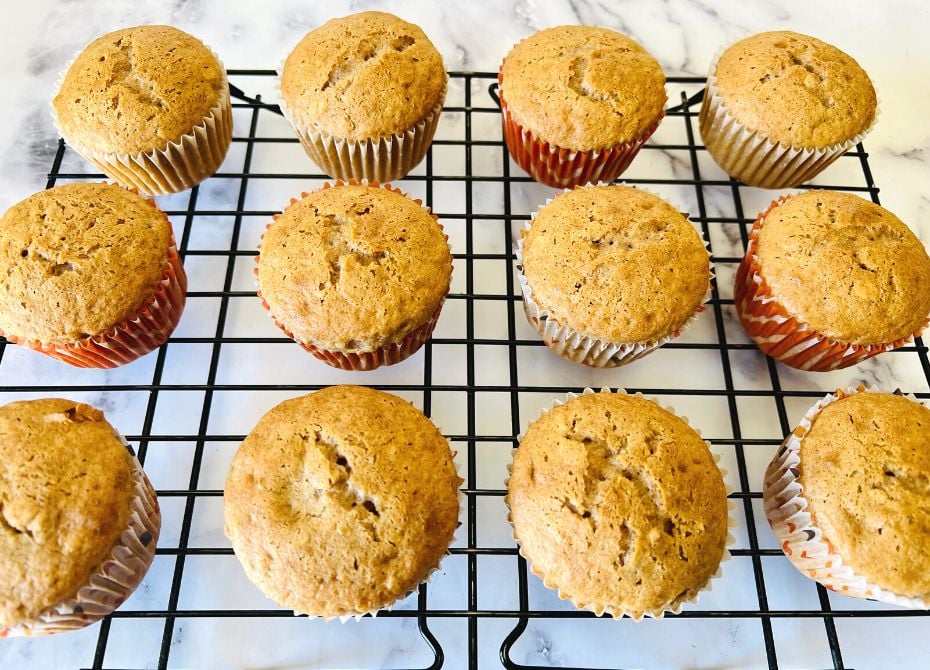 Oatmeal cream pie cupcakes on a cooling rack