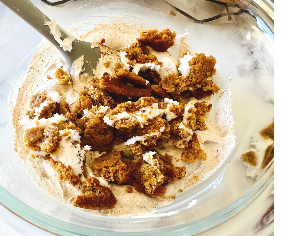 add the crushed oatmeal cream pies to the batter and mix them in