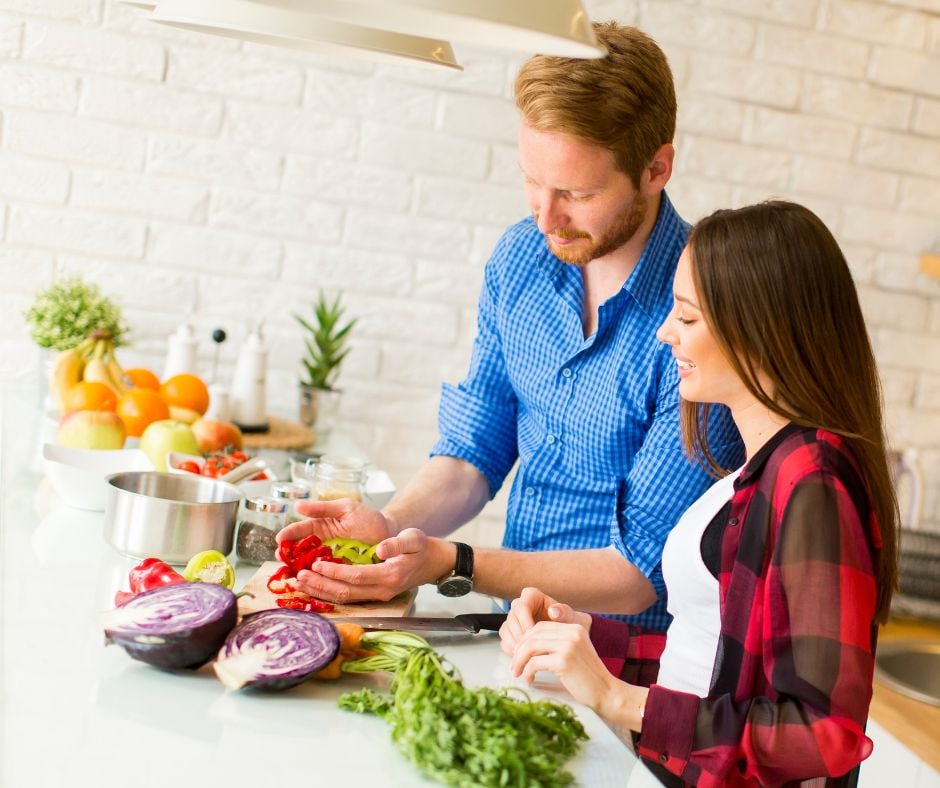 a couple cooking together