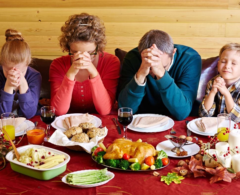 A Family saying Grace