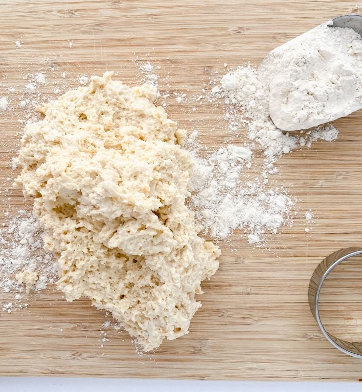 Biscuit dough on a floured surface