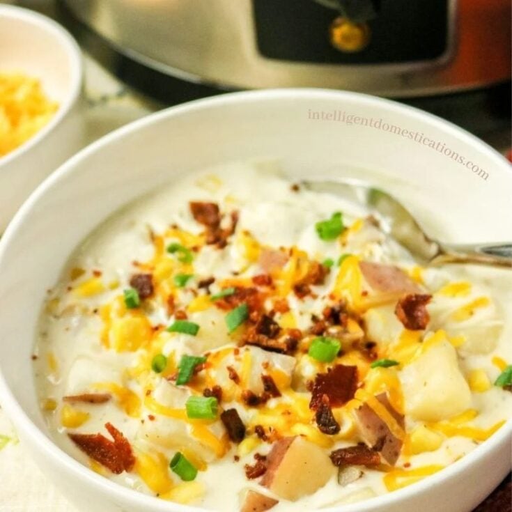 Image for This creamy Corn Chowder Recipe is slow cooked and filled with fresh cut potatoes, corn,  and chicken broth. 
