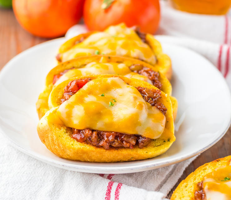 Three slices of Texas Toast Sloppy Joes on a serving plate