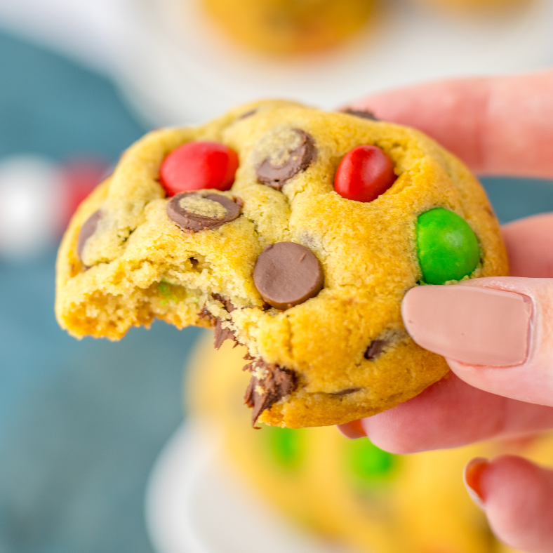 Close up of soft chocolate chip cookie with Christmas candies